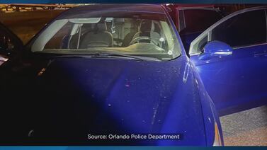 Photos: Orlando police release video of gunman shooting at officers in unmarked car