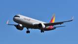 12 hurt when passenger opens aircraft door midflight; plane lands safely