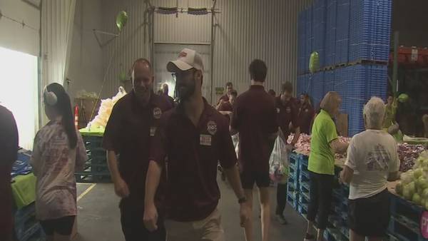 Volunteers help pack recess kits to inspire healthy play for local children