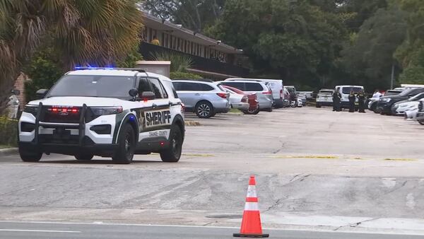 Photos: 2 dead, 1 hurt after deputy-involved shooting at Orange County hotel