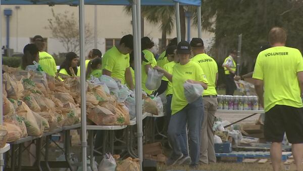 Photos: Volunteers give out thousands of free Thanksgiving meals in Kissimmee