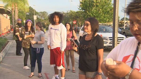 Video: Family and friends hold vigil for men shot by Osceola County deputies outside Target
