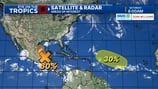 Tropical wave moving slowly into the Gulf of Mexico