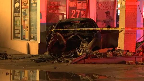Car strikes business, catches fire in DeLand