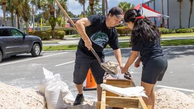 Photos: Already flooded, Shadowbay neighborhood braces for more water