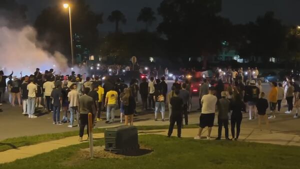 Video: ‘Utter recklessness’: Video shows huge crowds gather for street racing in local neighborhood