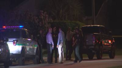 Photos: Detectives cordon off east Orange County neighborhood