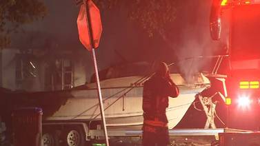 House and boat damaged by overnight fire in Titusville