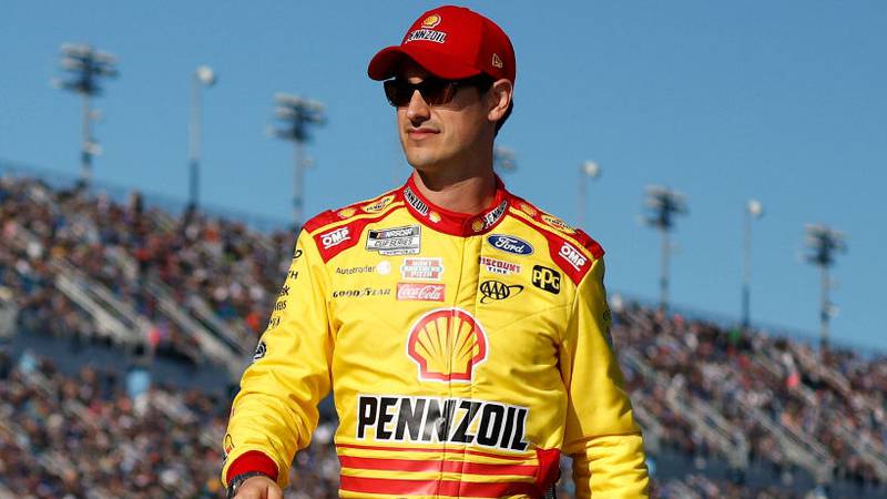 DAYTONA BEACH, FLORIDA - FEBRUARY 19: Joey Logano, driver of the #22 Shell Pennzoil Ford, walks onstage during driver intros prior to the NASCAR Cup Series Daytona 500 at Daytona International Speedway on February 19, 2024 in Daytona Beach, Florida. (Photo by Sean Gardner/Getty Images)