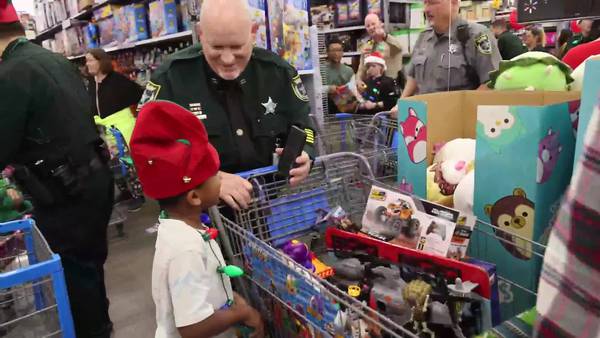 Flagler County deputies spread holiday cheer with ‘Shop with a Cop’