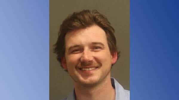 Morgan Wallen arrested, accused of throwing chair from bar roof