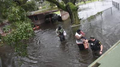 Photos: Crews rescue people stranded in Hurricane Ian's floodwaters