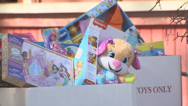 Disney and Marines help give out toys for Toys for Tots during the holiday season