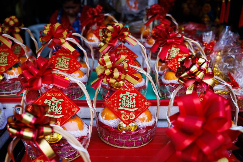 BANGKOK, THAILAND - FEBRUARY 09: Gift baskets available for purchase are seen in Chinatown on Lunar New Years Eve on February 09, 2024 in Bangkok, Thailand. The Chinese diaspora of Southeast Asia celebrates a lively Lunar New Year in Bangkok's Chinatown. It is traditionally a time for people to meet their relatives and take part in celebrations with families. In Thailand, which has a sizeable population of Chinese lineage, people gather with family and celebrate with feasts and visits to temples. The Tourism Authority of Thailand is expecting a steep increase in tourism during the Lunar New Year now that visa free travel is permmited for Chinese citizens to Thailand. (Photo by Lauren DeCicca/Getty Images)