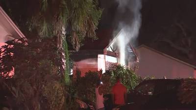 Photos: Family escapes house fire in Orange County