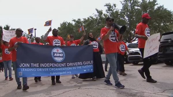 Uber, Lyft drivers shut off their apps to rally for better pay, working conditions