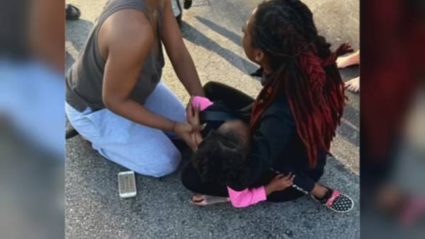 ‘Like a shooting range’: Neighbors rush to the aid of girl, 3, shot in car seat