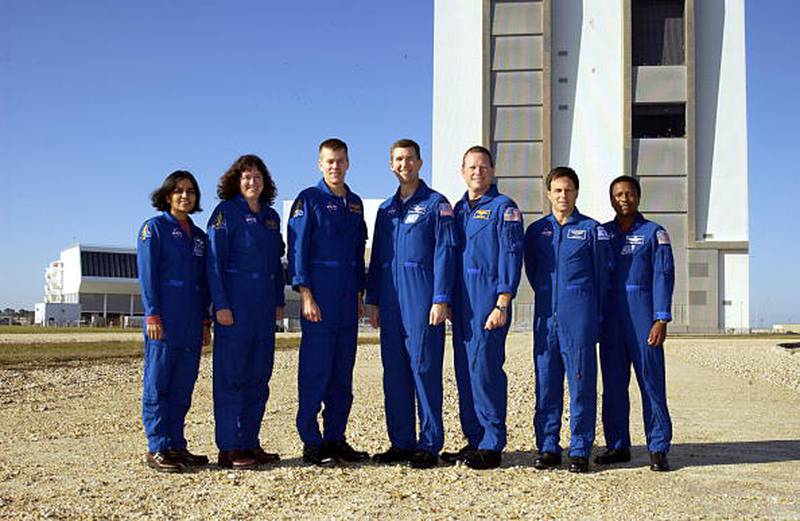 The crew of the Space Shuttle Columbia mission; specialists Kalpana Chawla and Laurel Clark, pilot William "Willie" McCool, commander Rick Husband, mission specialist David Brown, payload specialist Ilan Ramon and payload commander Michael Anderson (L to R) pose for a picture on December 18, 2002 at Kennedy Space Center in Cape Canaveral, Florida. Columbia broke up upon re-entry to earth February 1, 2003.  (Photo by NASA/Getty Images)