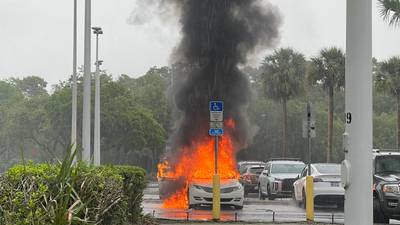Photos: Shoppers rescue 2 kids from car fire while mother was shoplifting at Oviedo Mall, police say