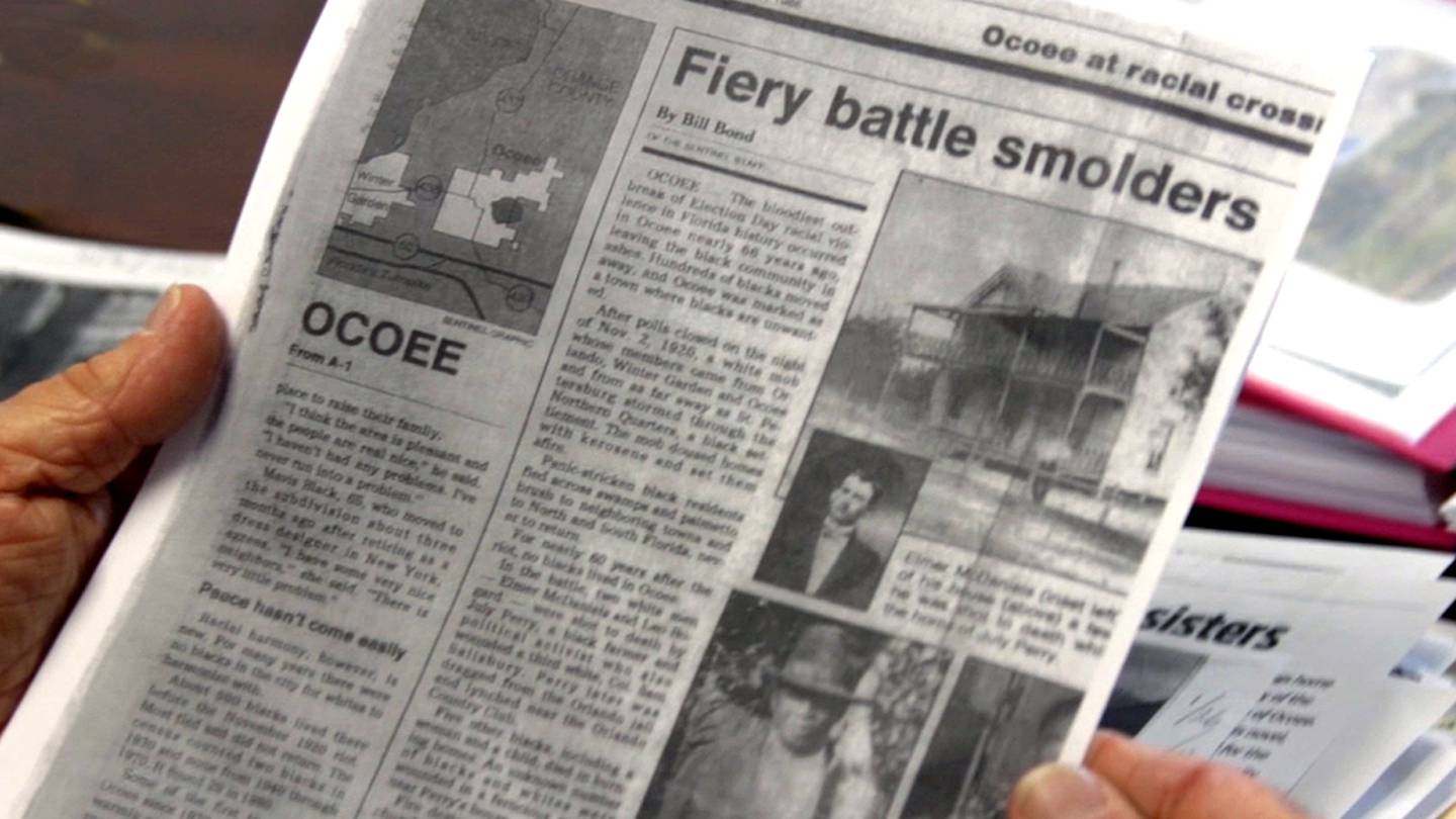 A newspaper headline chronicles the history of the Ocoee Massacre nearly seven decades after it occured.