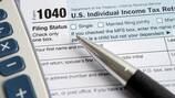 IRS tells millions to hold off on filing income tax returns