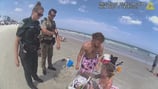 Deputies: Georgia couple found asleep, surrounded by alcohol, as kids wander away on Daytona Beach
