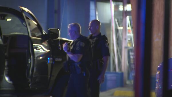 Photos: Police: One hurt after gunfire near busy Orlando intersection