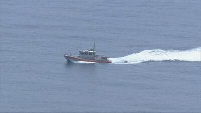 Photos: Coast guard searching for missing man after boat washes ashore in Brevard County
