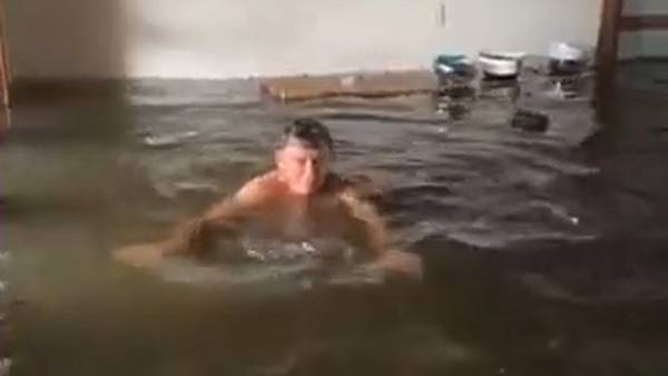 Naples Park home floods, man swims through rooms