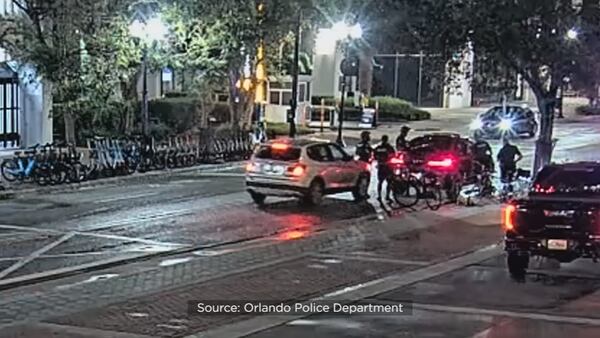 Police: Woman charged with DUI after crashing into 3 officers, vehicle in downtown Orlando