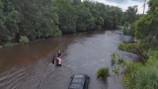 WATCH: Florida county leaders help rescue man trapped in Debby floodwaters