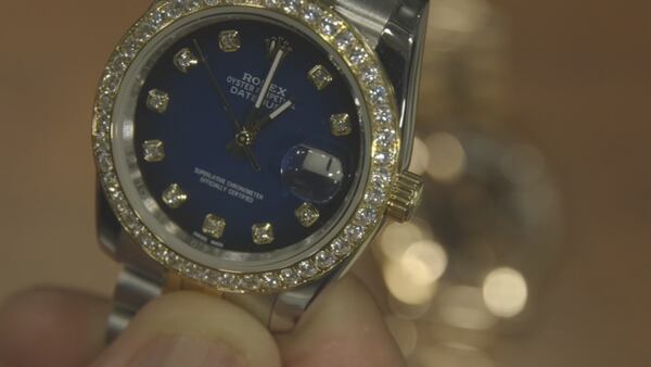 ‘I can spot a fake’: Counterfeit designer watches & purses from overseas are flooding into the U.S.