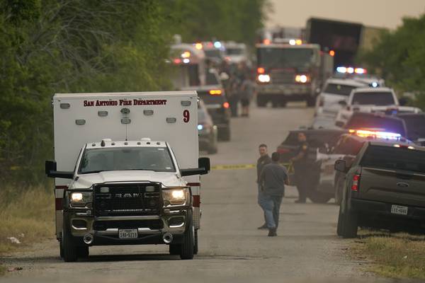 Photos: Dozens of suspected migrants found dead inside big-rig in San Antonio