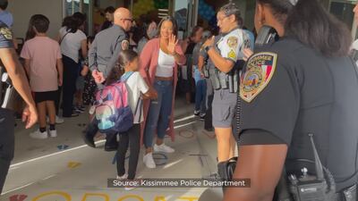 Photos: Kissimmee police walk fallen officer Matthew Baxter’s daughters to first day of school