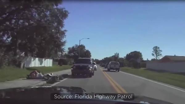 WATCH: FHP trooper credited with saving motorcyclists life after medical emergency in Poinciana