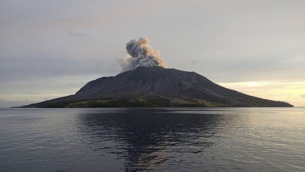 Airport near volcano reopens as Indonesia lowers eruption alert level