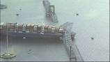 Rescue efforts underway after cargo ship hits Baltimore bridge, causing it to collapse