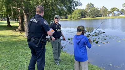 Law enforcement officials host free event to teach kids how to fish