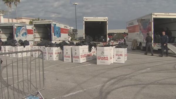 Seminole County families pick up toys from Toys for Tots holiday campaign