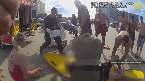 WATCH: Volusia Sheriff shares body-cam video of first responders rescuing lifeless man from surf