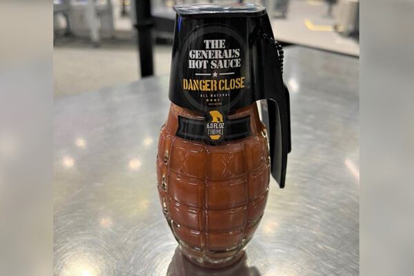 Passenger attempts to bring grenade-shaped hot sauce bottle on plane