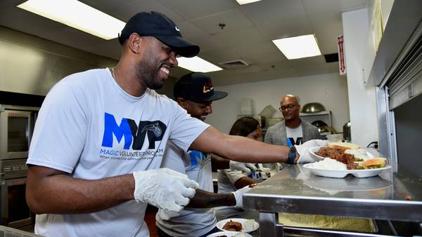 Orlando Magic staff members join Coalition for the Homeless ‘Meal Serve’ event