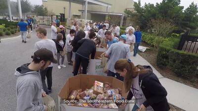 Photos: Orange County church, food bank partner to deliver tons of food to low-income communities