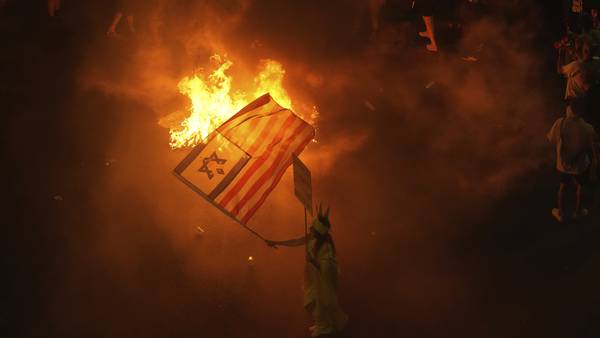 Israelis surge into the streets again in protest as the toll in Gaza grows