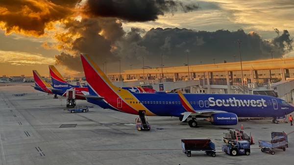 Southwest Airlines passenger opens plane’s emergency door, jumps onto wing
