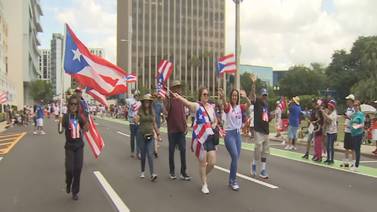 Thousands of people gather in Downtown Orlando for the annual Puerto Rican Parade