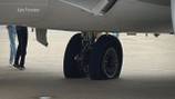 Passenger airliner blows tires while braking to avoid crash with flight headed to Florida