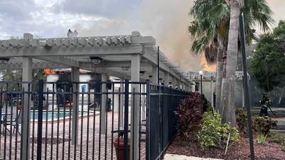 Photos: Apartment clubhouse fire causes damage to roof, no injuries