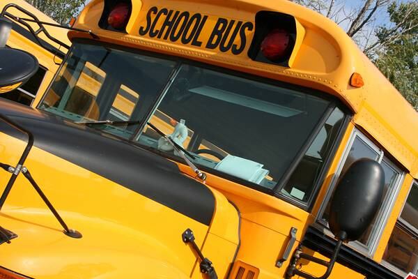 7th grader stops school bus from veering into traffic after driver passes out