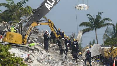 Photos: Families of those lost in Surfside building collapse reach settlement